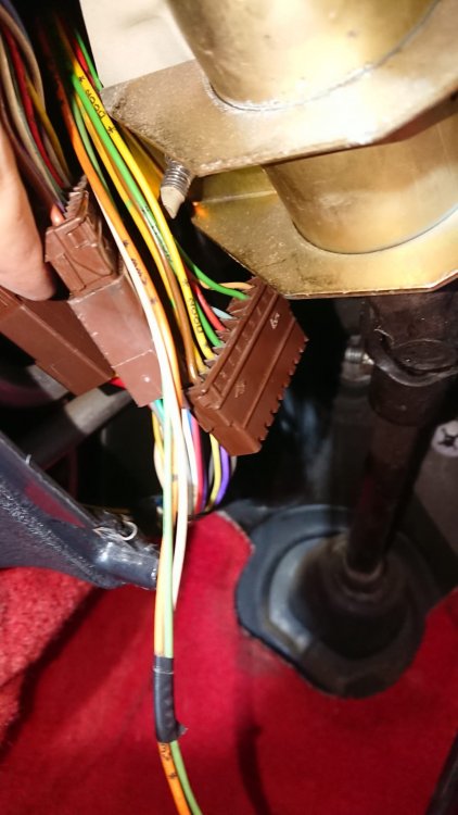 Brown plug under steering wheel.jpeg